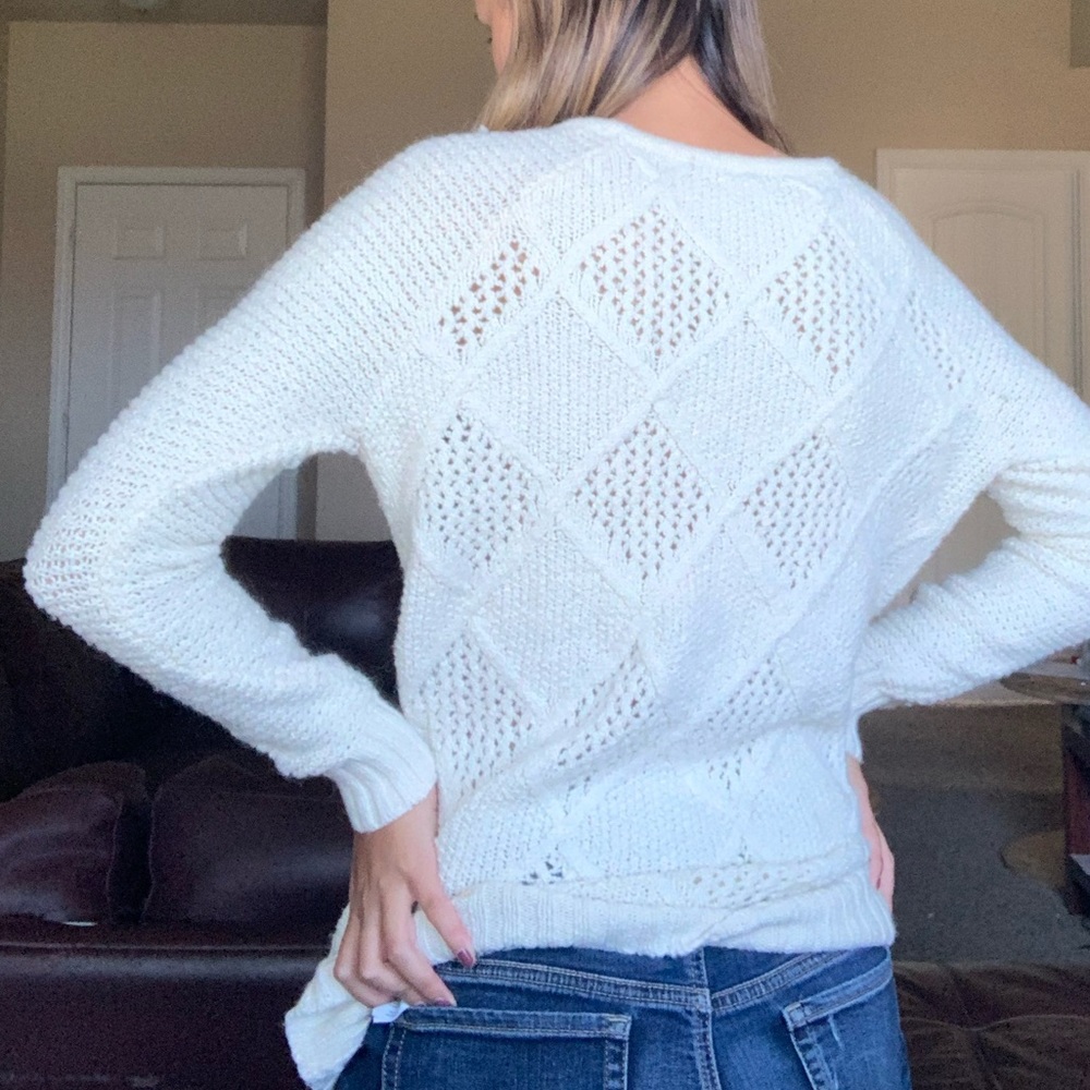 white fuzzy sweater